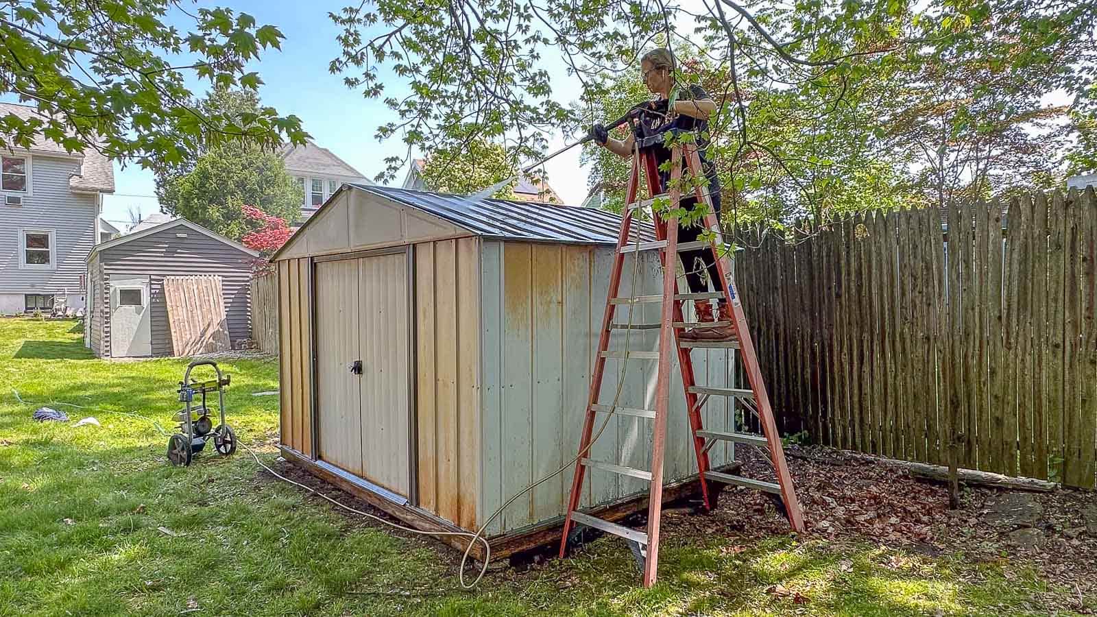 pressure washing the top of the shed