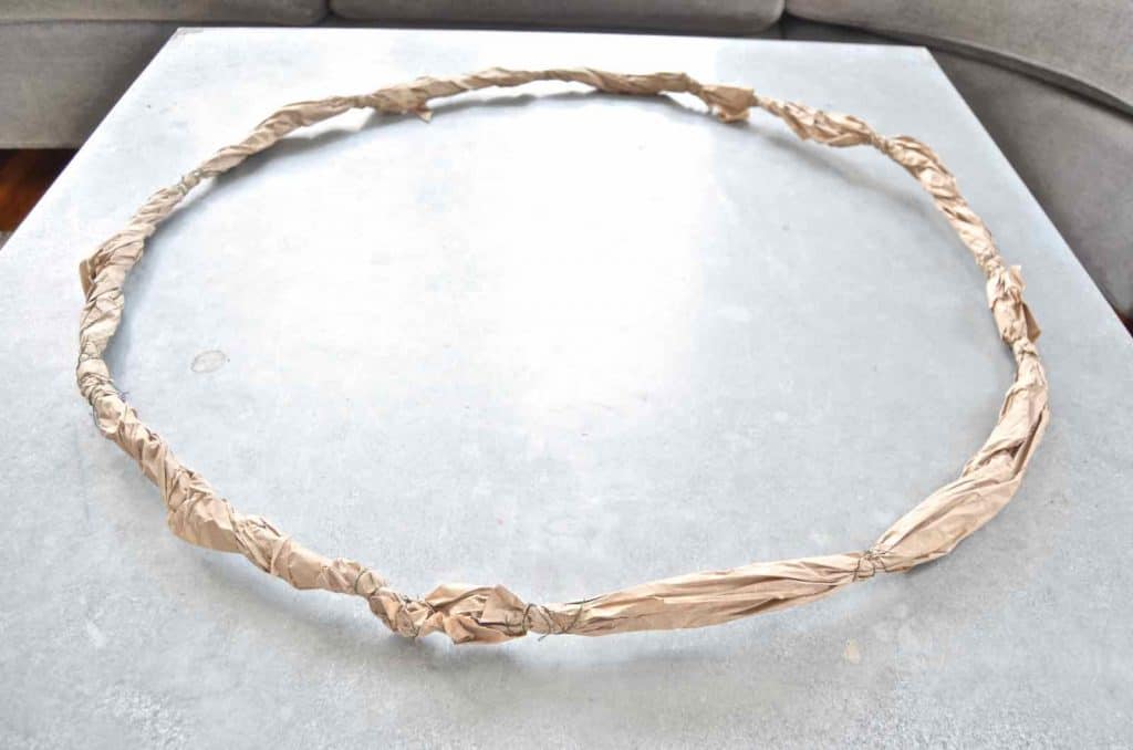 Make a simple, inexpensive spring wreath out of coat hangers!