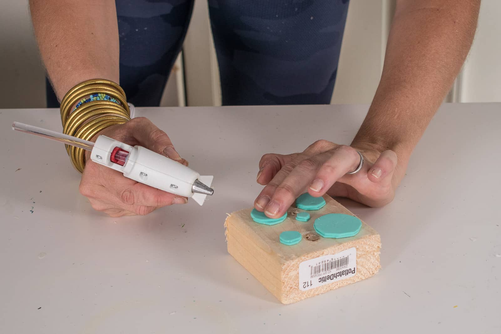 hot glue foam onto scrap wood