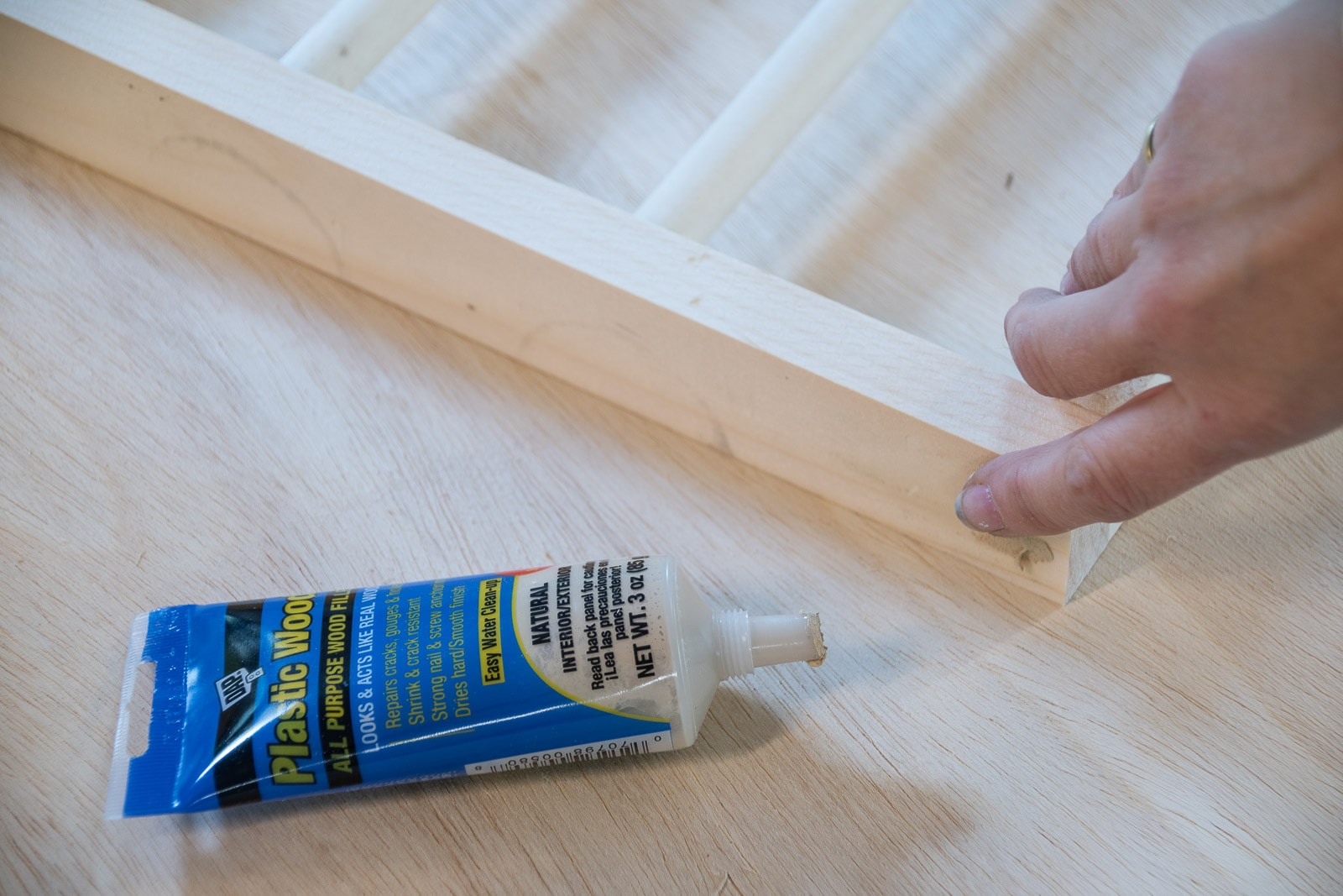 fill screw holes and paint drying rack