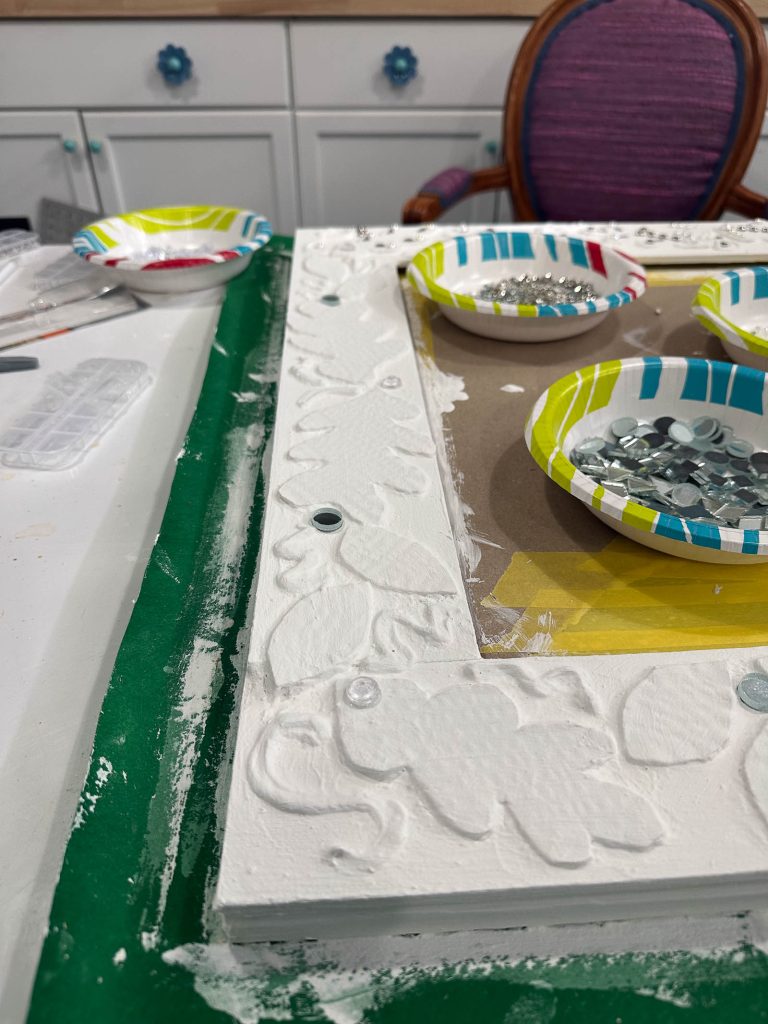 embellishing the bergdorf mirror