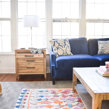 layered rug in family room