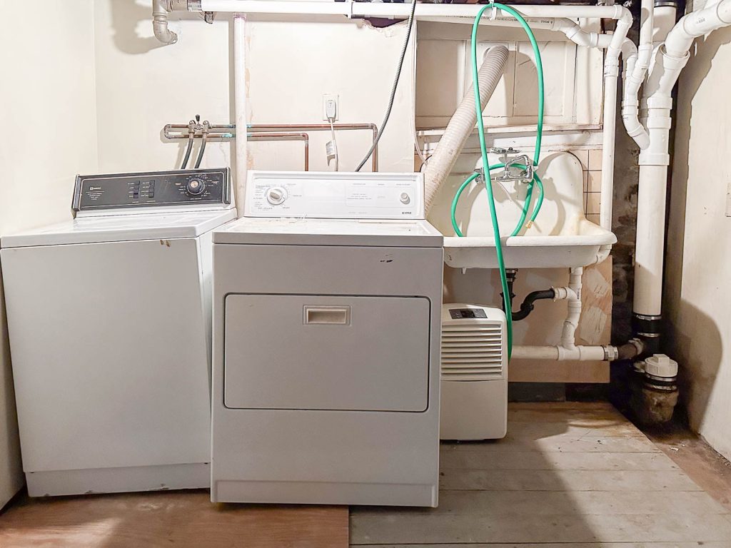 laundry room flip house before