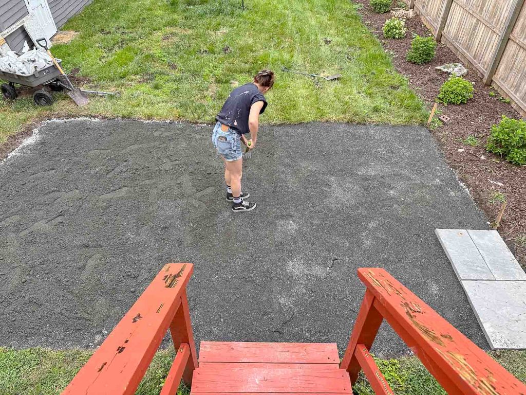 spreading the paver sand