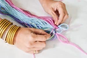 gather three clumps of yarn for unicorn tail