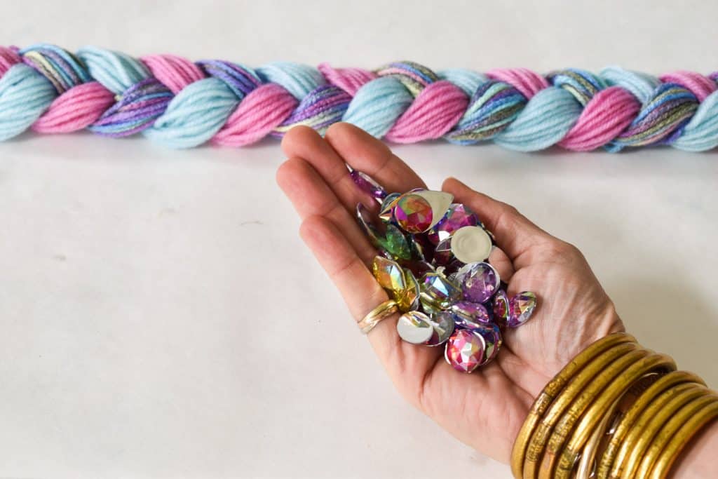 decorate tail with gems and flowers