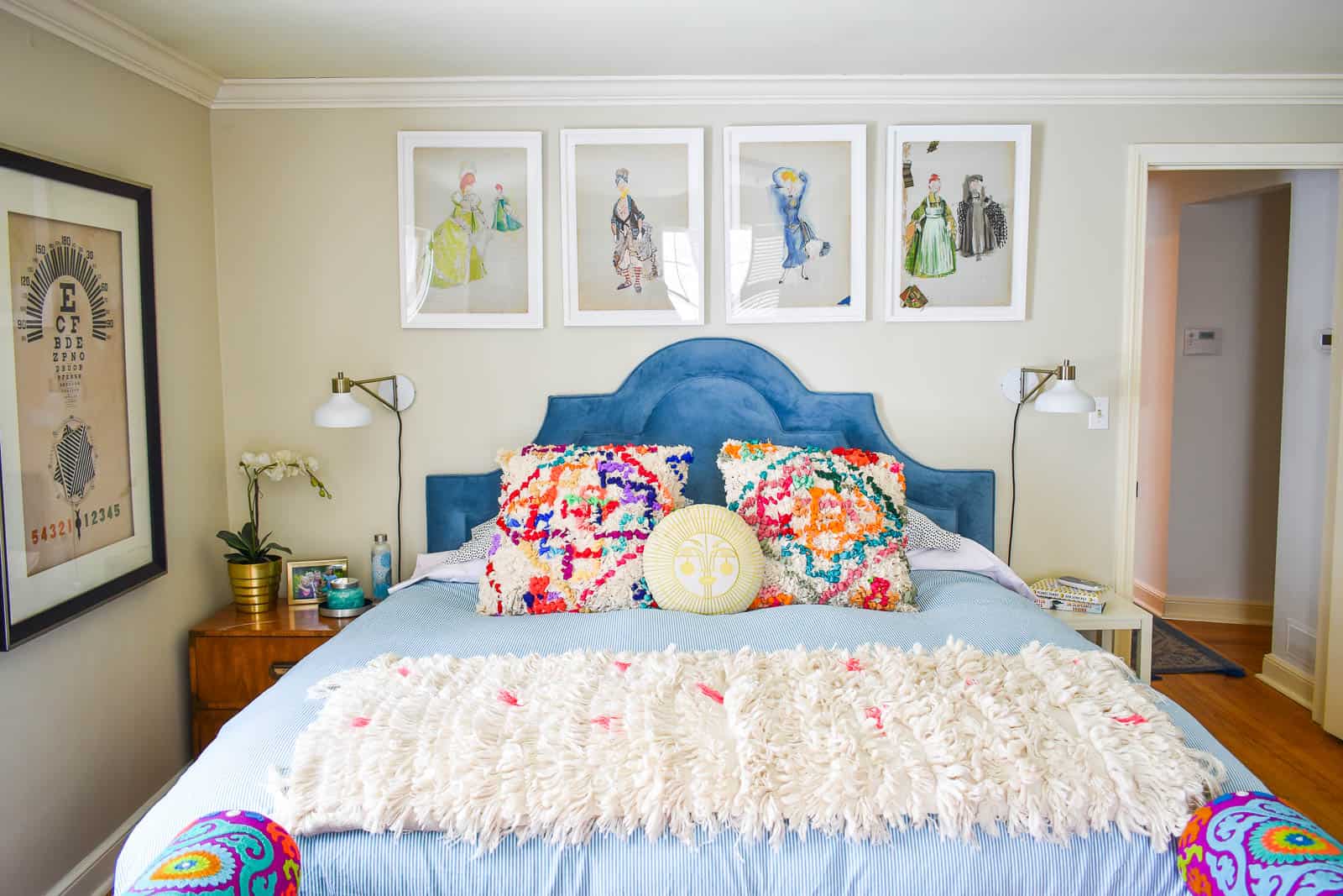 artwork over the headboard in the master