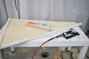 adhere, staple and trim batting