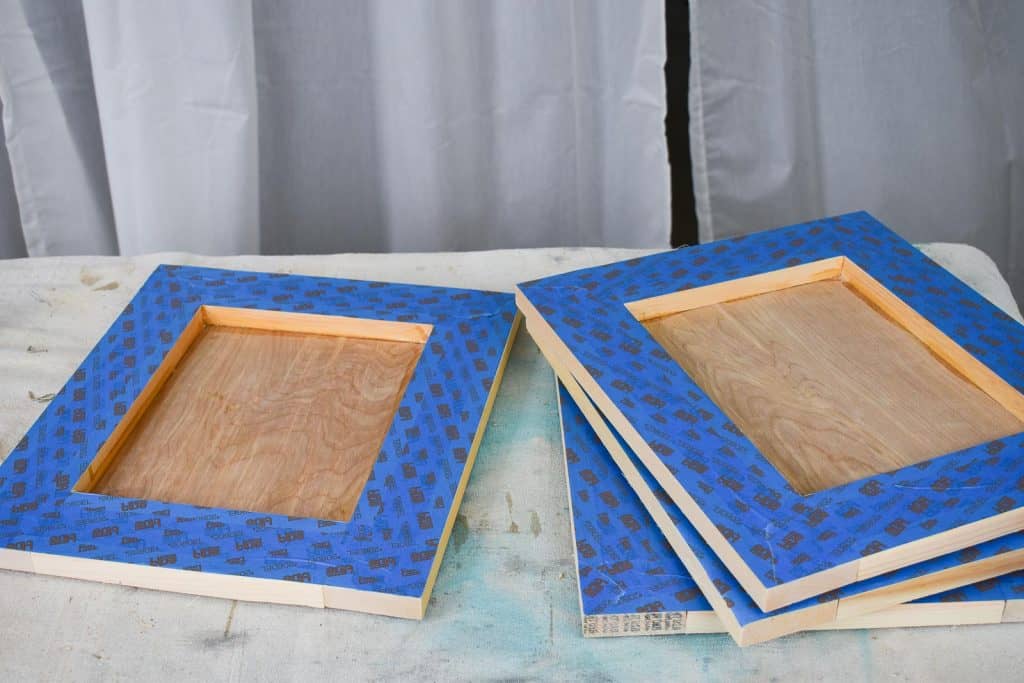 tape of top of wooden frame