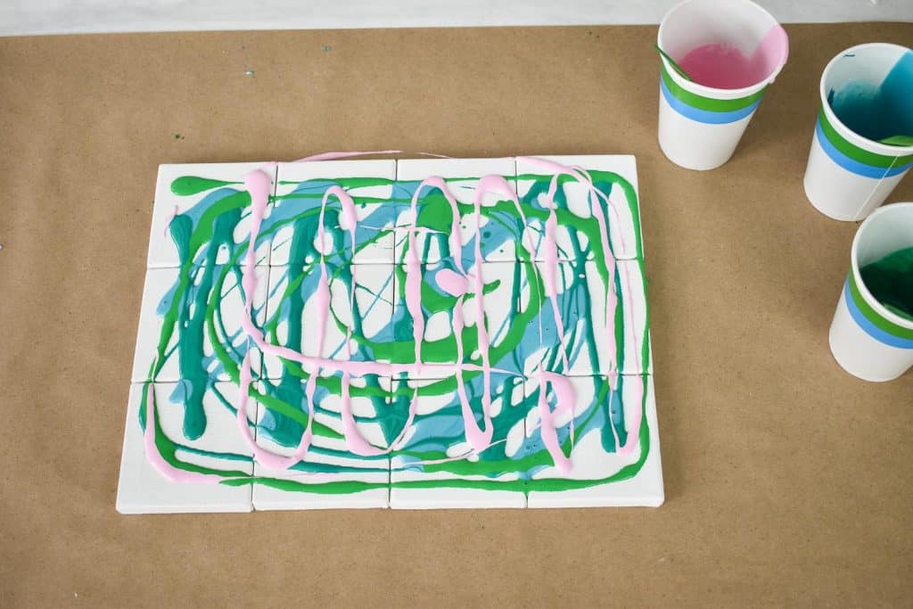 cluster canvases and pour the paint