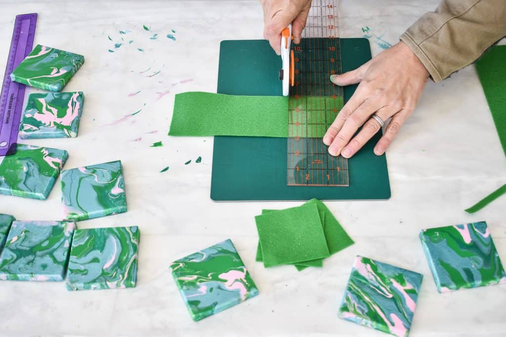 add felt and ribbon to back of canvas