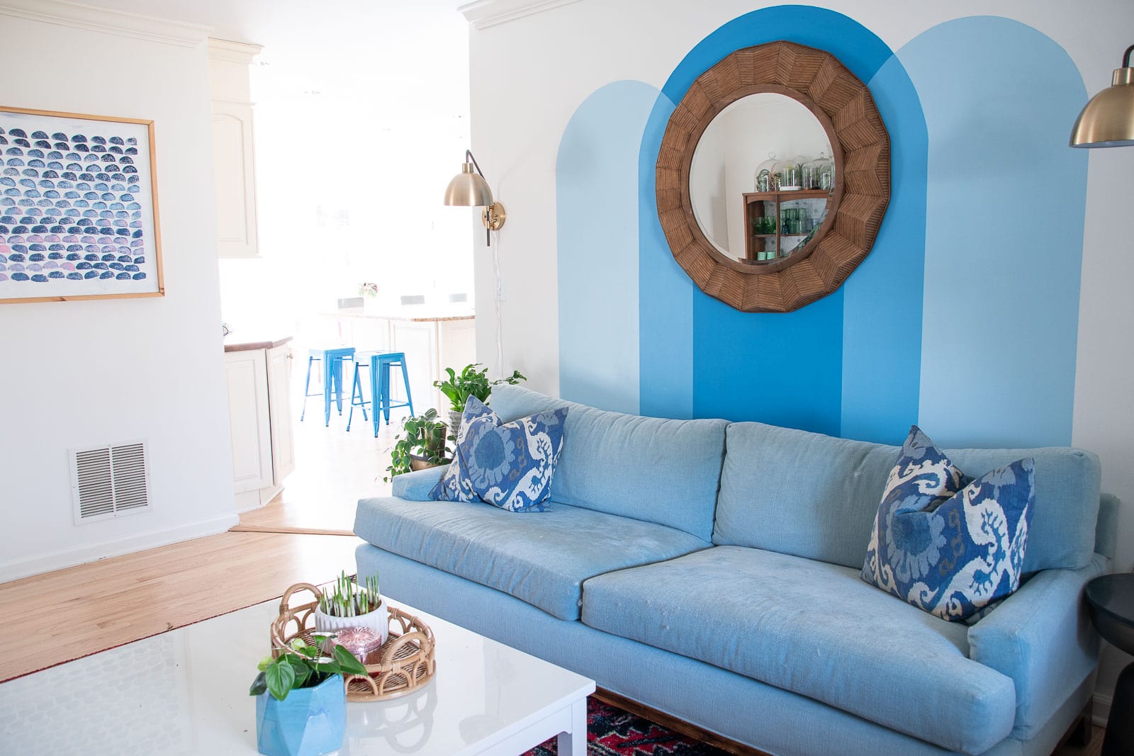 white walls behind arch mural