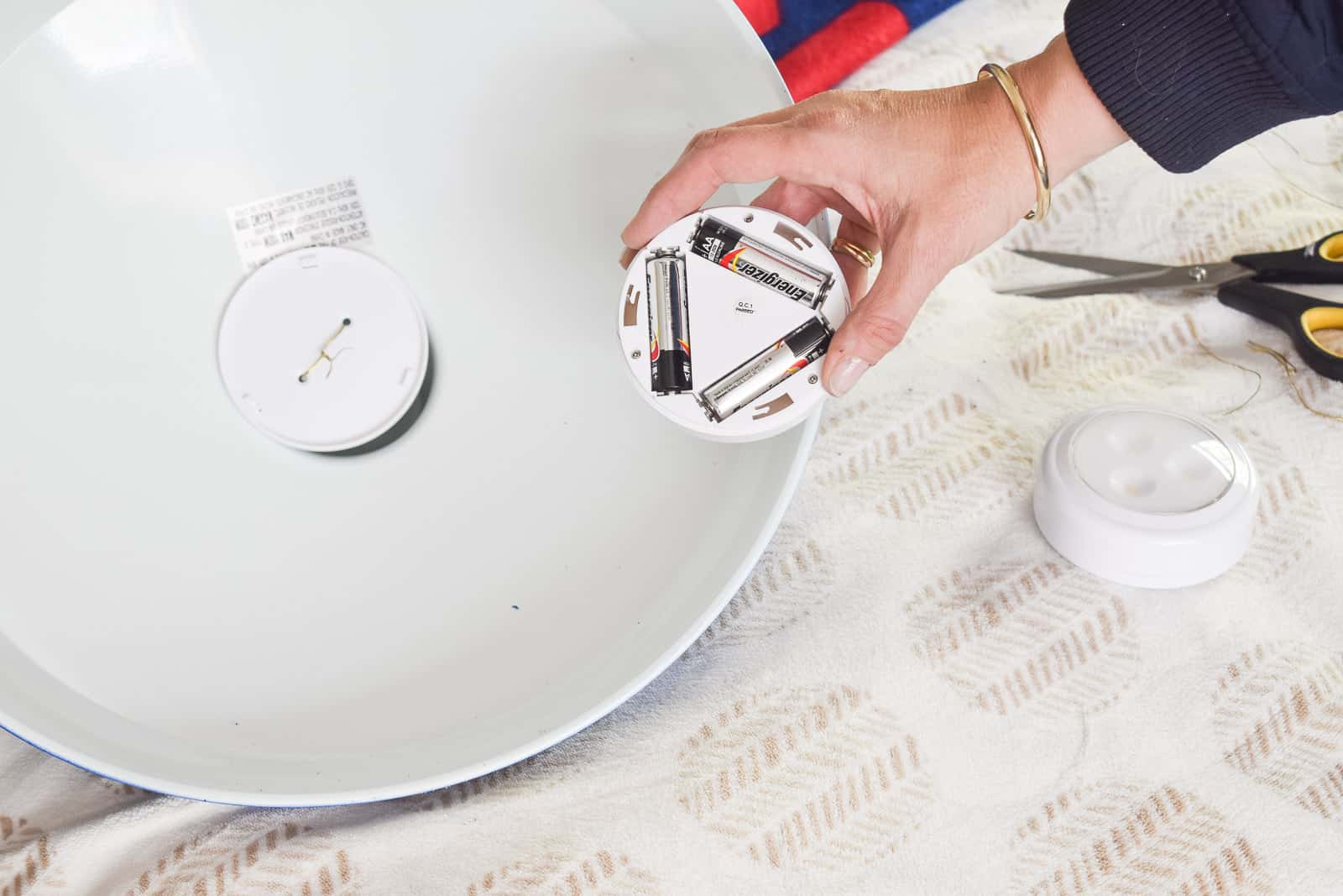 wire the puck light onto the pendant light