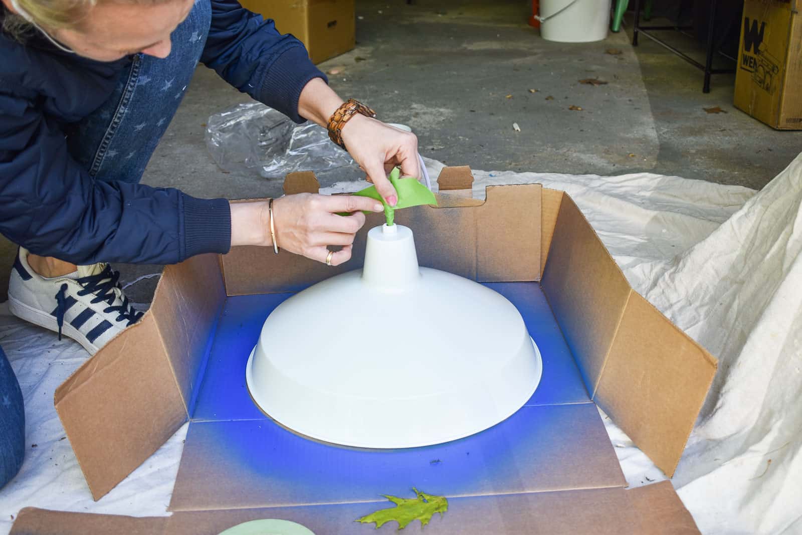Tape off the cord of the pendant light