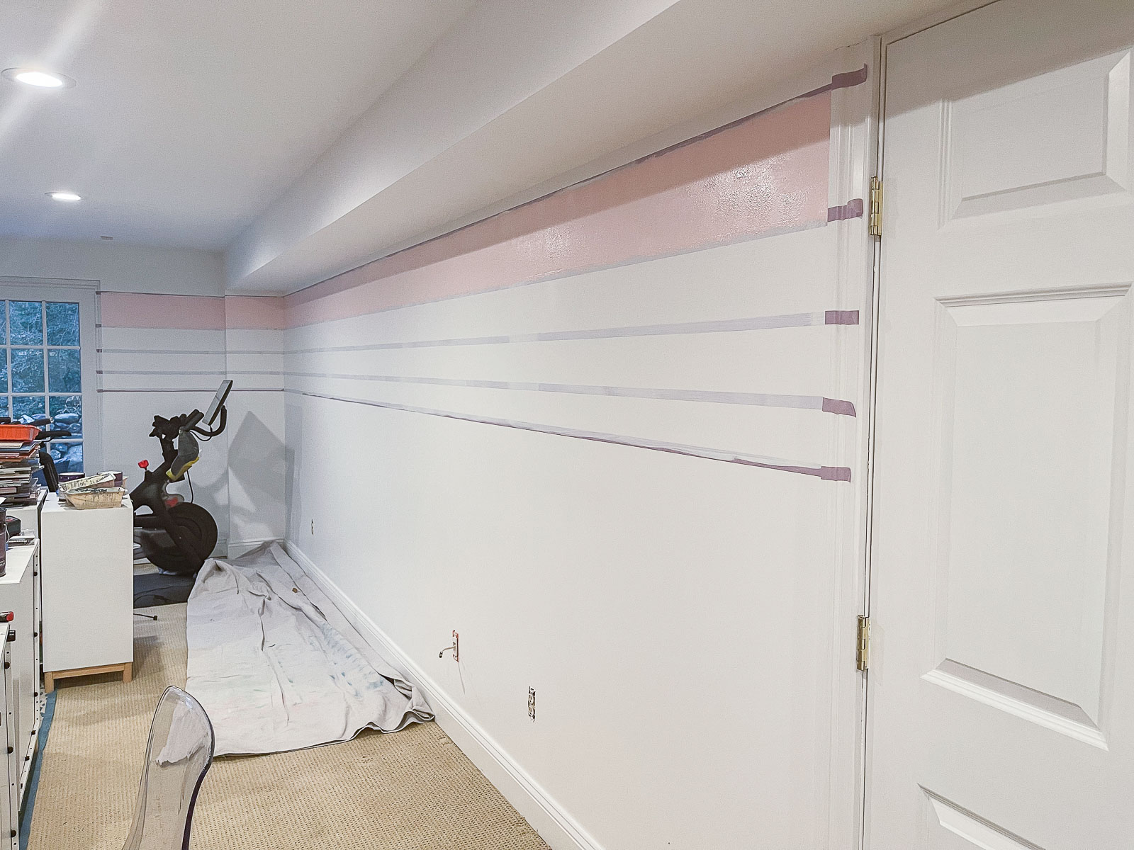 painting stripes on the wall