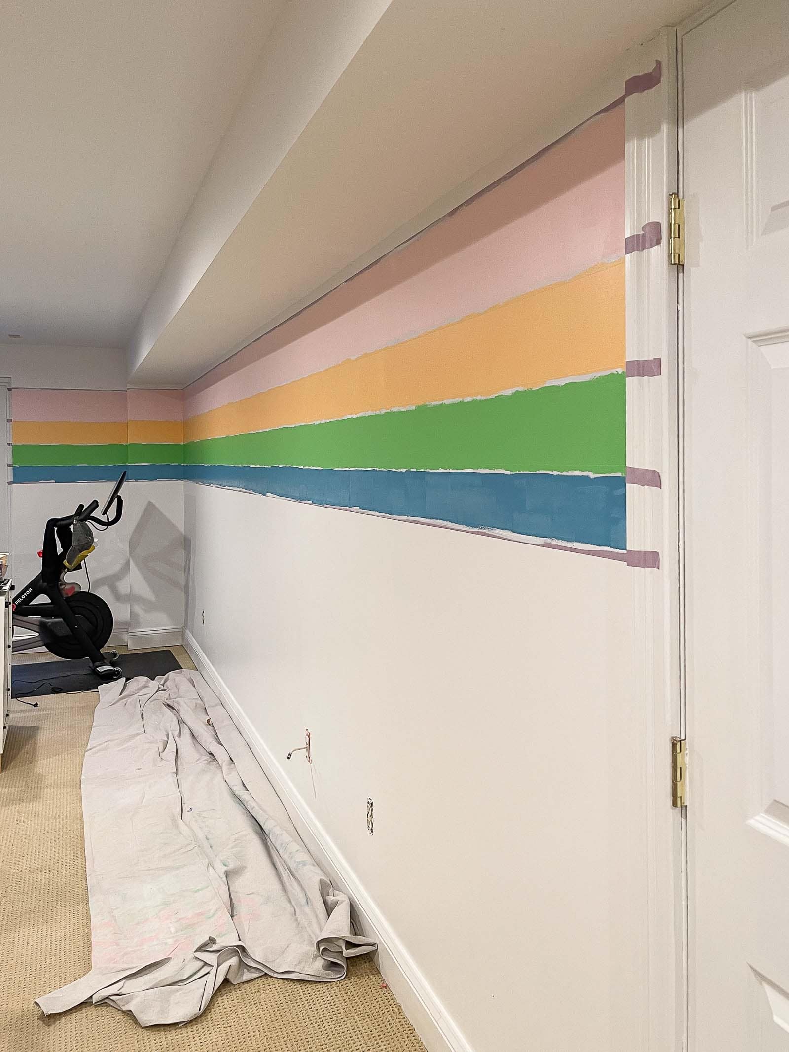 painting stripes on the wall