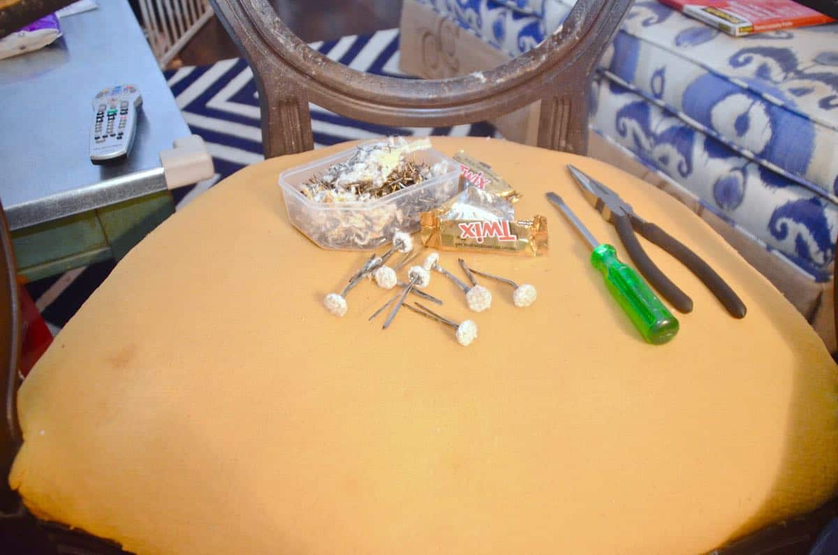 how to reupholster old armchairs with colorful new fabric.