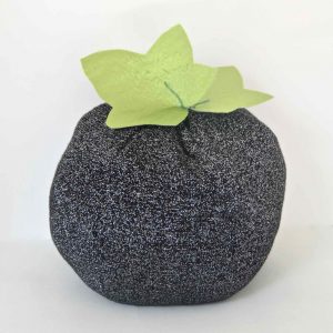 Stuffed pumpkins made from scrap fabric all ready for Halloween decor.