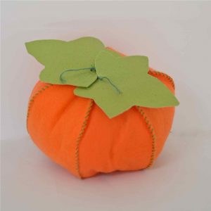 Stuffed pumpkins made from scrap fabric all ready for Halloween decor.