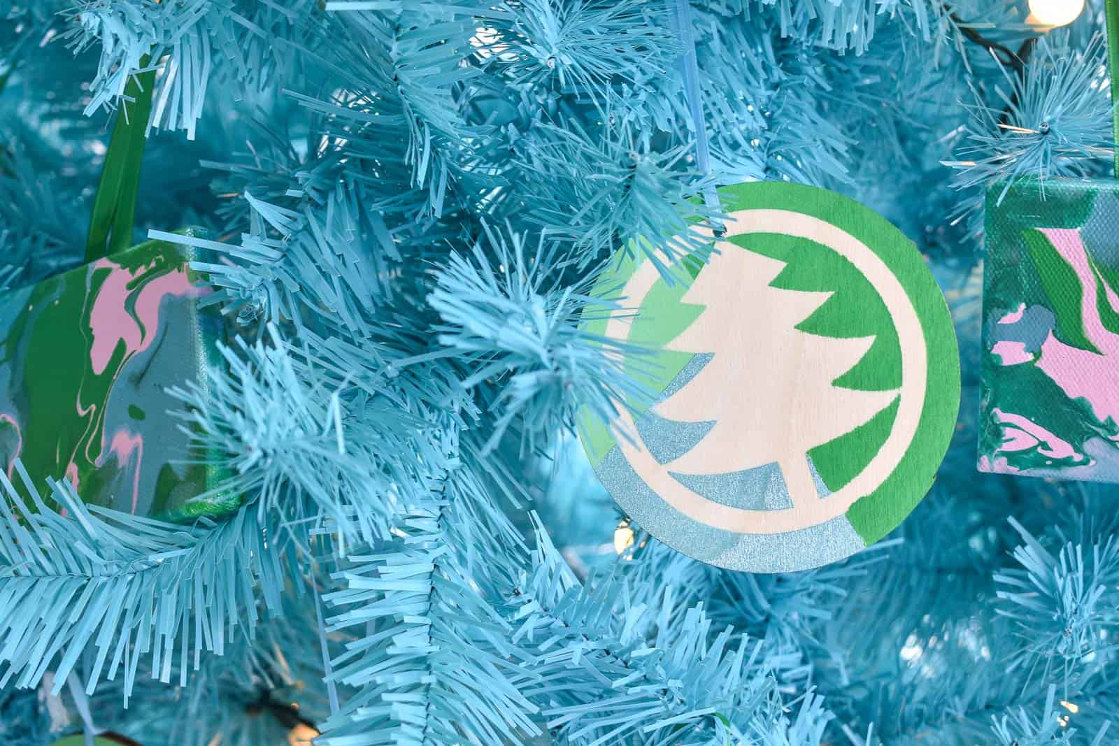 drill a hole and place ribbon in ornament