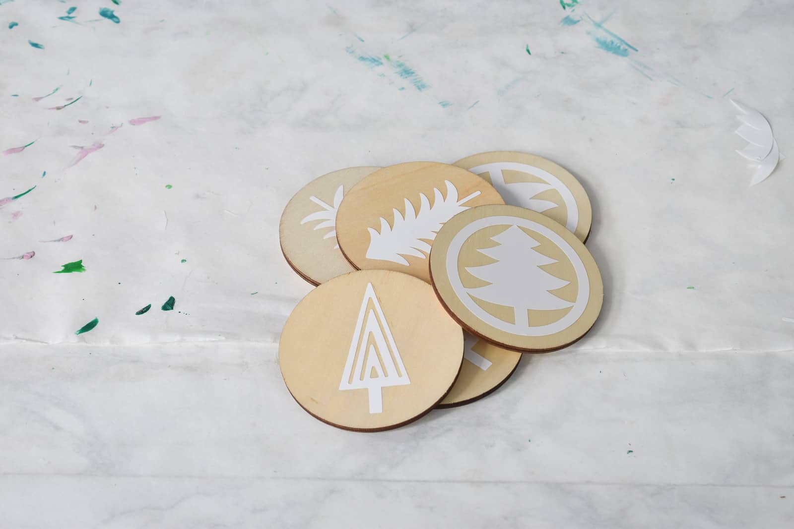 make a stencil and place it on the ornament