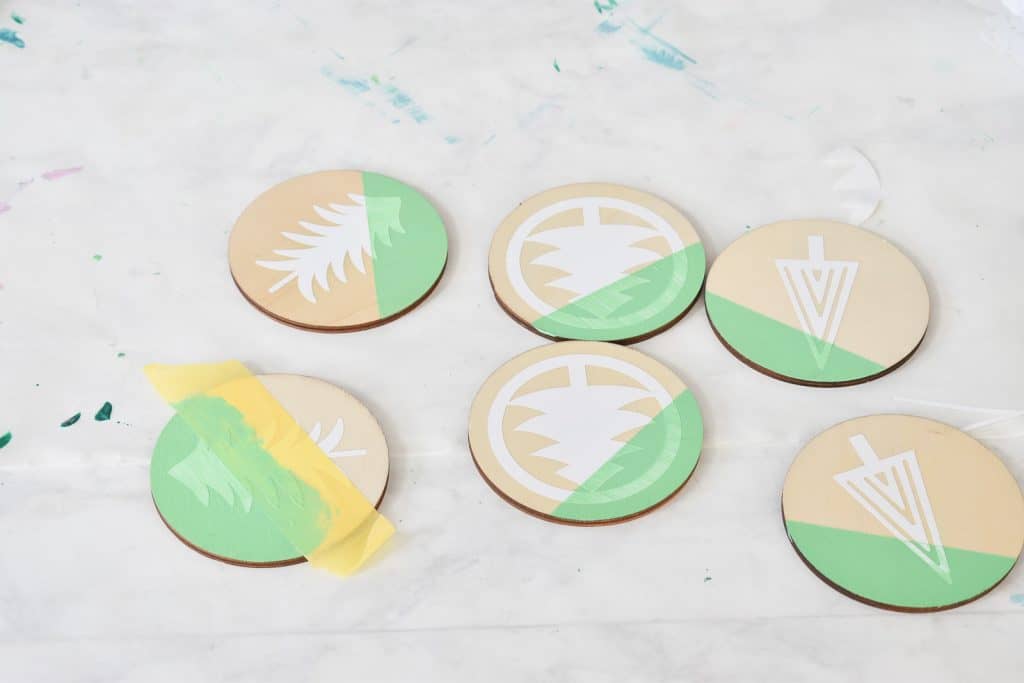 tape off and paint 1/2 your stenciled ornament